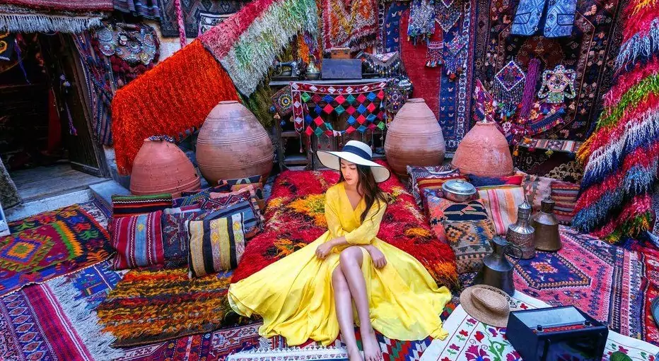 15 Fun Things to Do in Cappadocia, Turkey 15 Beautiful girl at traditional carpet shop in Goreme city, Cappadocia in Turkey